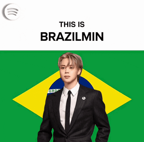a man in a suit and tie is standing in front of a brazilian flag with the words this is brazilmin above him