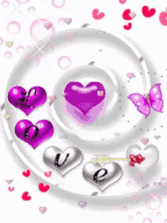 a purple heart surrounded by other hearts and butterflies