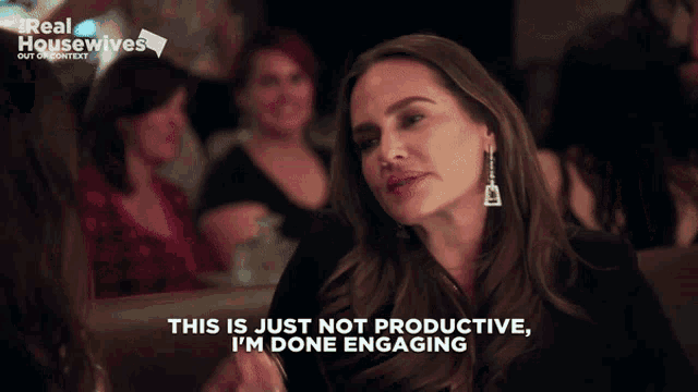 a woman says " this is just not productive i 'm done engaging " in front of a crowd