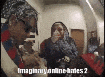 a group of people sitting in a room with the words imaginary online hates 2 written on the bottom