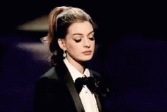 Anne Hathaway I Wont Say Who GIF - Anne Hathaway I Wont Say Who GIFs