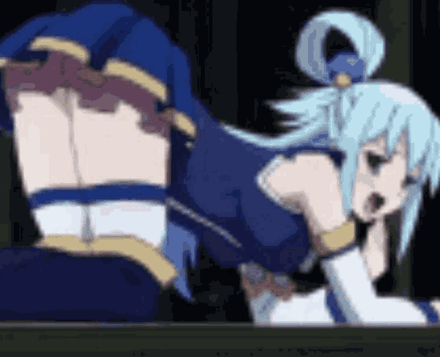 a girl in a blue dress is laying on her stomach in a dark room .