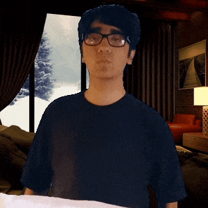 a man wearing glasses and a black shirt is standing in front of a window