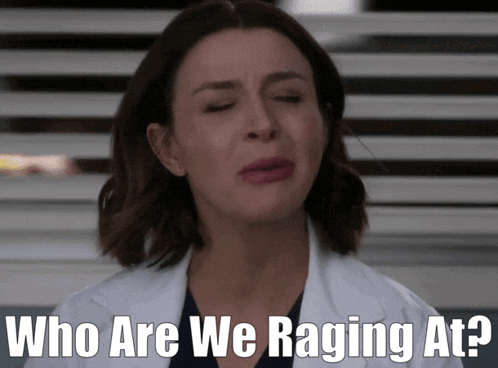 a woman in a lab coat is crying with the words " who are we raging at " below her