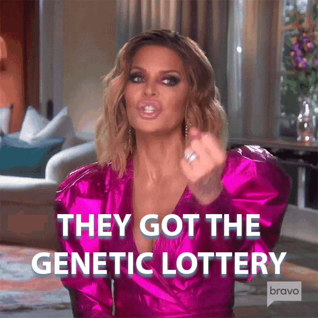 a woman in a pink dress says they got the genetic lottery on bravo