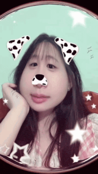 a girl with dalmatian ears and a dog nose