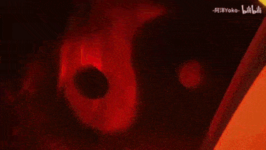 a close up of a fire burning in the dark