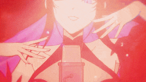 a woman in a purple dress is holding a microphone in her hand