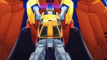 a yellow robot is standing in front of an orange robot