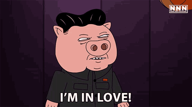 a cartoon pig says " i 'm in love " in front of a nnn logo