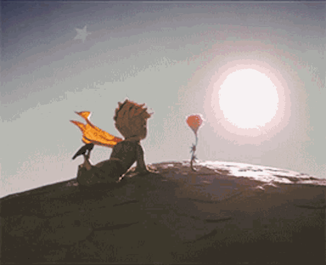 a little boy is sitting on a rock with a rose and a bird