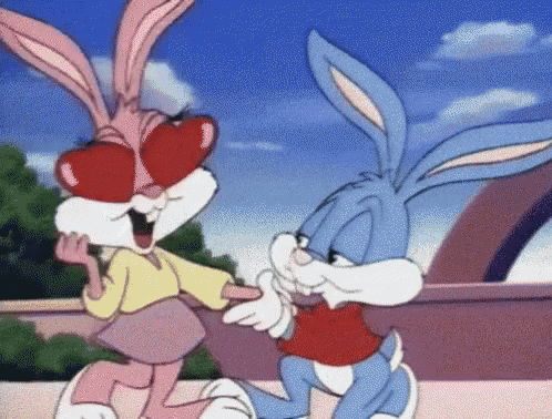 bugs bunny and baby bugs are dancing together in a cartoon