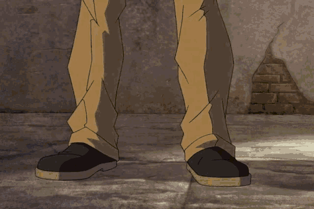 a cartoon character 's legs are shown with a yellow stripe on the side