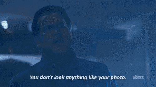 a man in a blue shirt says you don 't look anything like your photo