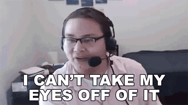 a man wearing headphones and glasses is talking on a video call .