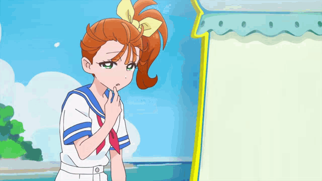 a girl with a bow in her hair is standing in front of a white board