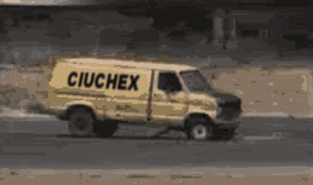 a yellow van with the word ciuchex on the side