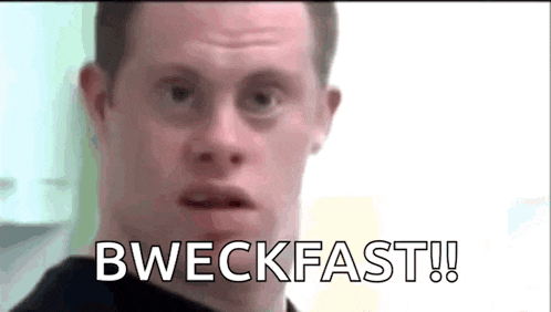a man with down syndrome is making a funny face and says bweckfast !