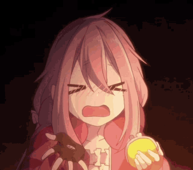 a pink haired anime girl is crying while holding a wallet