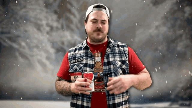 a man in a plaid vest holds a can of beer and a bottle of beer