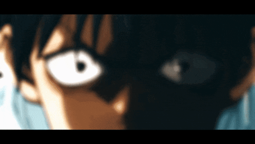 a close up of a person 's eyes with a blurred background