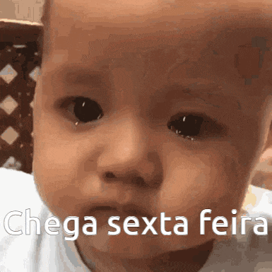 a baby 's face is shown with the words " chega sexta feira " written on it