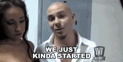 a man and a woman are standing next to each other and the man is saying we just kinda started .