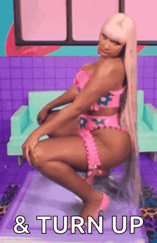 a woman in a pink bikini is squatting down and the words " & turn up " are written on the bottom