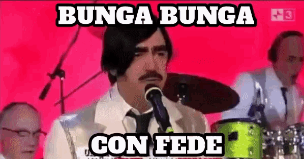 a man singing into a microphone with the words bunga bunga con fede written above him
