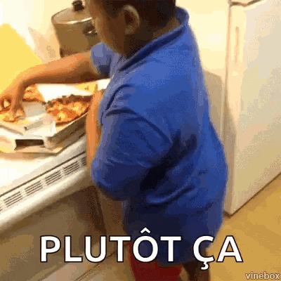 a young boy in a blue shirt is standing in front of a pizza box with the words plutot ca written on the bottom .