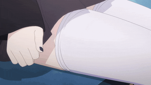 a close up of a person 's leg with white socks