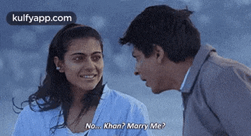 a man and a woman are talking to each other and the woman is asking the man if he wants to marry her .
