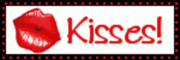 a sign that says kisses with a red lip