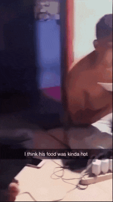a man is sitting on the floor with a bowl of food and a caption that says i think his food was kinda hot