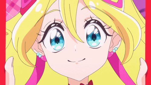 a cartoon girl with blonde hair and blue eyes is smiling for the camera