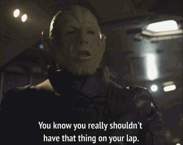 a screenshot of a movie with the caption " you know you really shouldn 't have that thing on your lap "