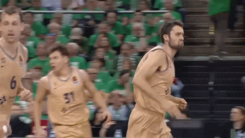 a group of basketball players wearing gold uniforms with the number 31 on them