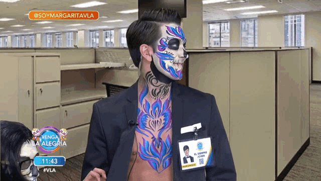 a man with face paint and a name tag that says r. martinez