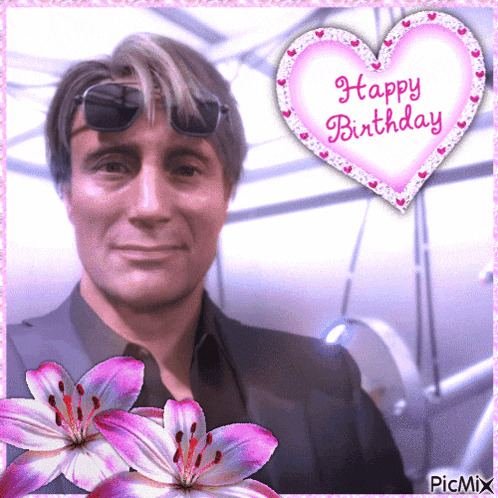 a pink heart with the words happy birthday on it