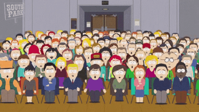 a large group of people are sitting in front of a sign that says south park