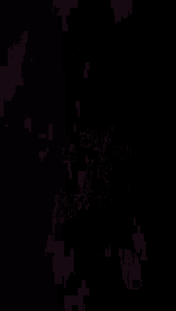 a black and white image of a planet with stars