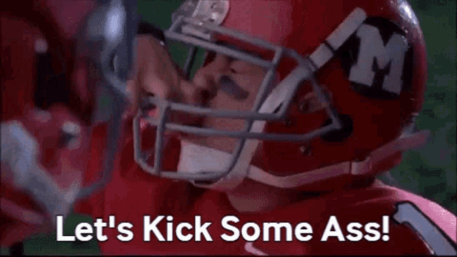 a football player wearing a red helmet is saying `` let 's kick some ass '' .