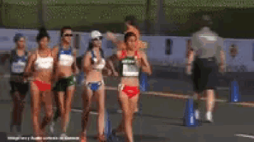two women are running in a race and one has the word mexico on her top