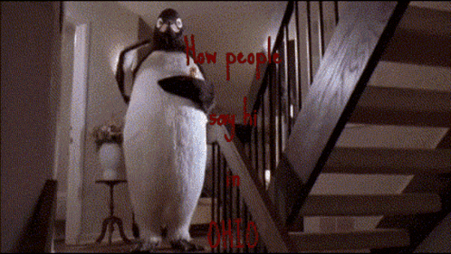 a penguin is standing on a set of stairs with the words " new people " written in red letters