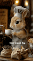 a stuffed bunny is wearing a chef 's hat and apron and holding a cup of coffee .