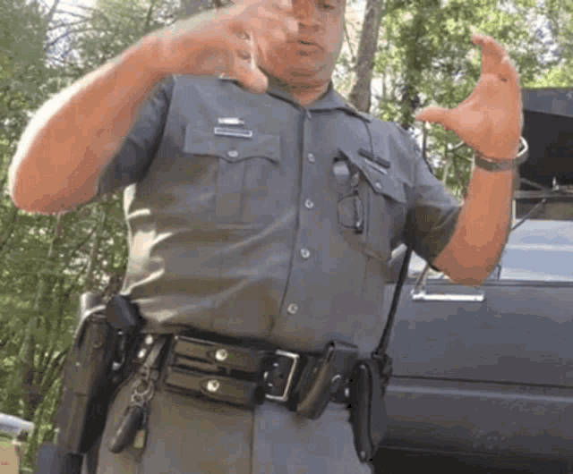 a man in a police uniform with the name williams on his shirt