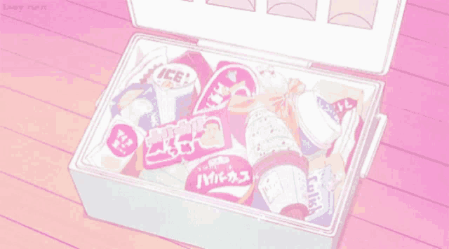 a pink box filled with ice cream and milk