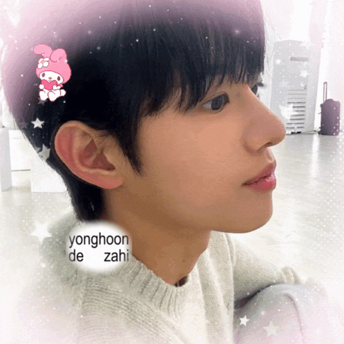 a picture of a young man with a sticker that says yonghoon de zahi