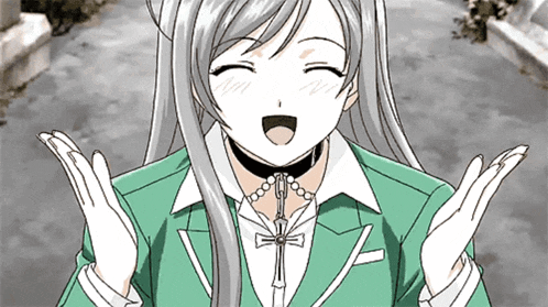 a girl in a green suit with a cross around her neck is making a funny face