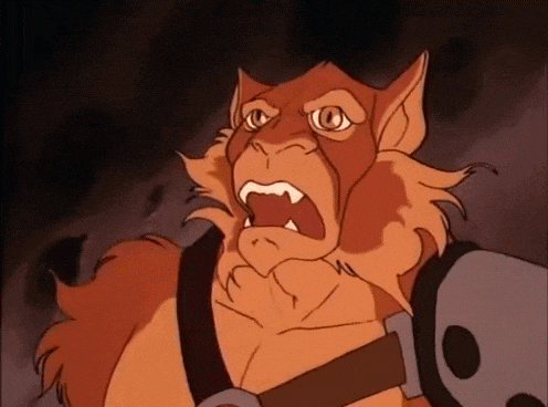 a close up of a cartoon character with his mouth open and his teeth showing .